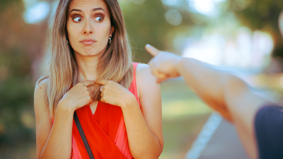 Surprised Woman being Accused of Something Awful Stressed girl being wrongfully accused by someone mean