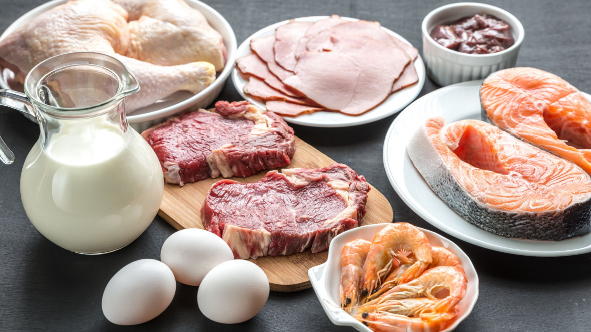 Protein diet: raw products on the wooden background