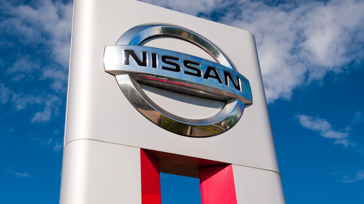 Nissan dealership logo on July 26, 2015, Klaipeda, Lithuania. Nissan Motor Corporation is a Japanese multinational automobile manufacturer headquartered in Nishi-ku, Yokohama, Japan.