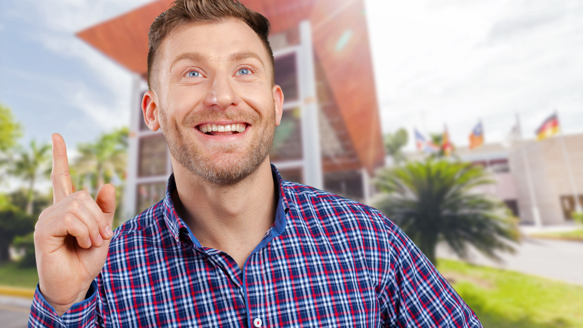 surprised young happy man just came up with idea.