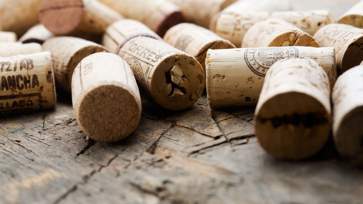 Bunch of wine corks on wooden table