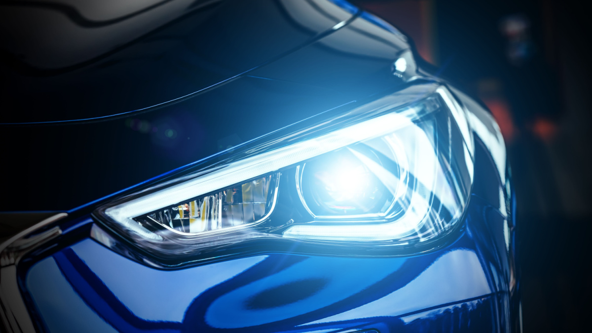 Macro view of modern blue car xenon lamp headlight