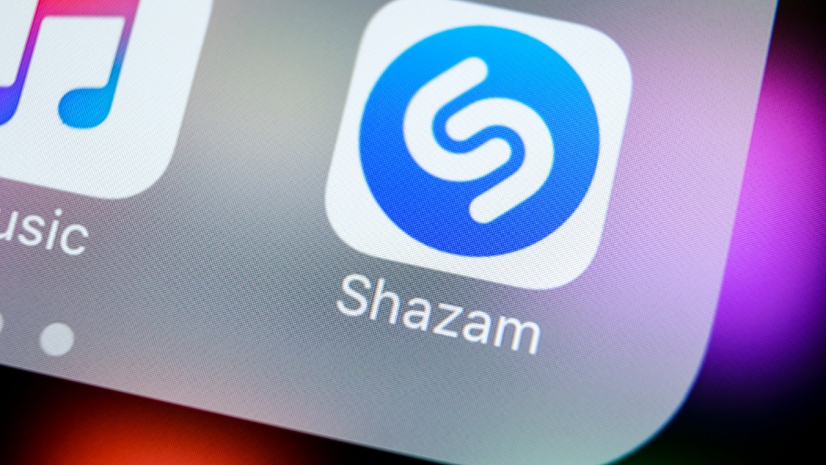 Shazam application icon on Apple iPhone X screen close-up. Shazam app icon. Shazam is popular online music application. Social media app