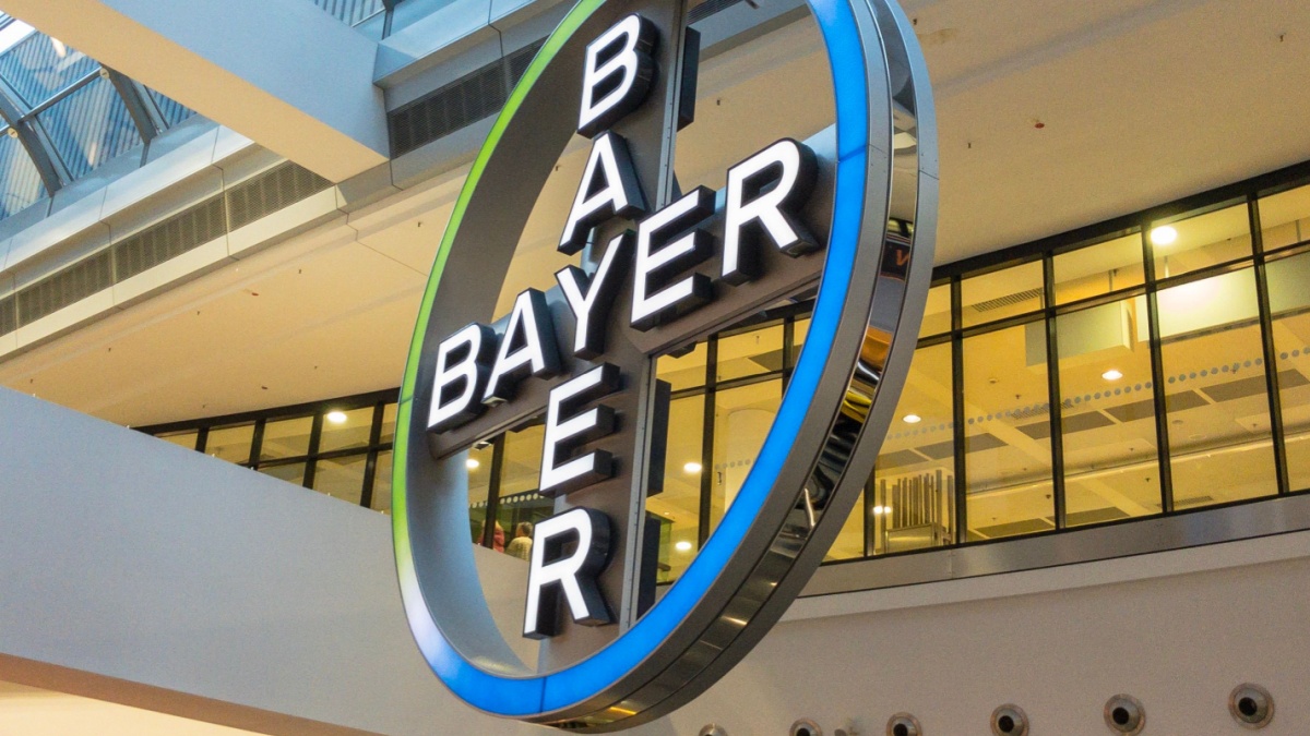 Bayer sign light board in Frankfurt international airport is rotating around , Pharmaceutical company