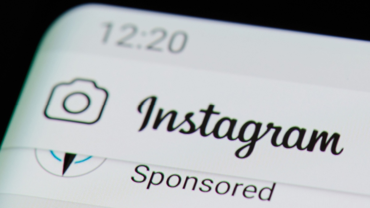 Sponsored post in instagram feed on digital screen macro close up view