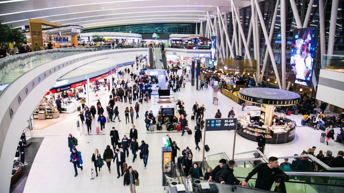 Ferenc Liszt International Airport Budapest architecture and passengers around. Ferenc Liszt Airport in Budapest is the largest airport in Hungary.
