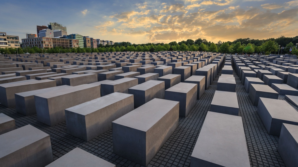 Jewish Holocaust Memorial museum and Berlin city skyline when sunset, Berlin, Germany