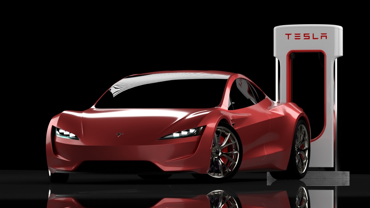 Stock Photo ID: 1803971389Szczecin,Poland-August 2020:Tesla Roadster with Charger in studio.