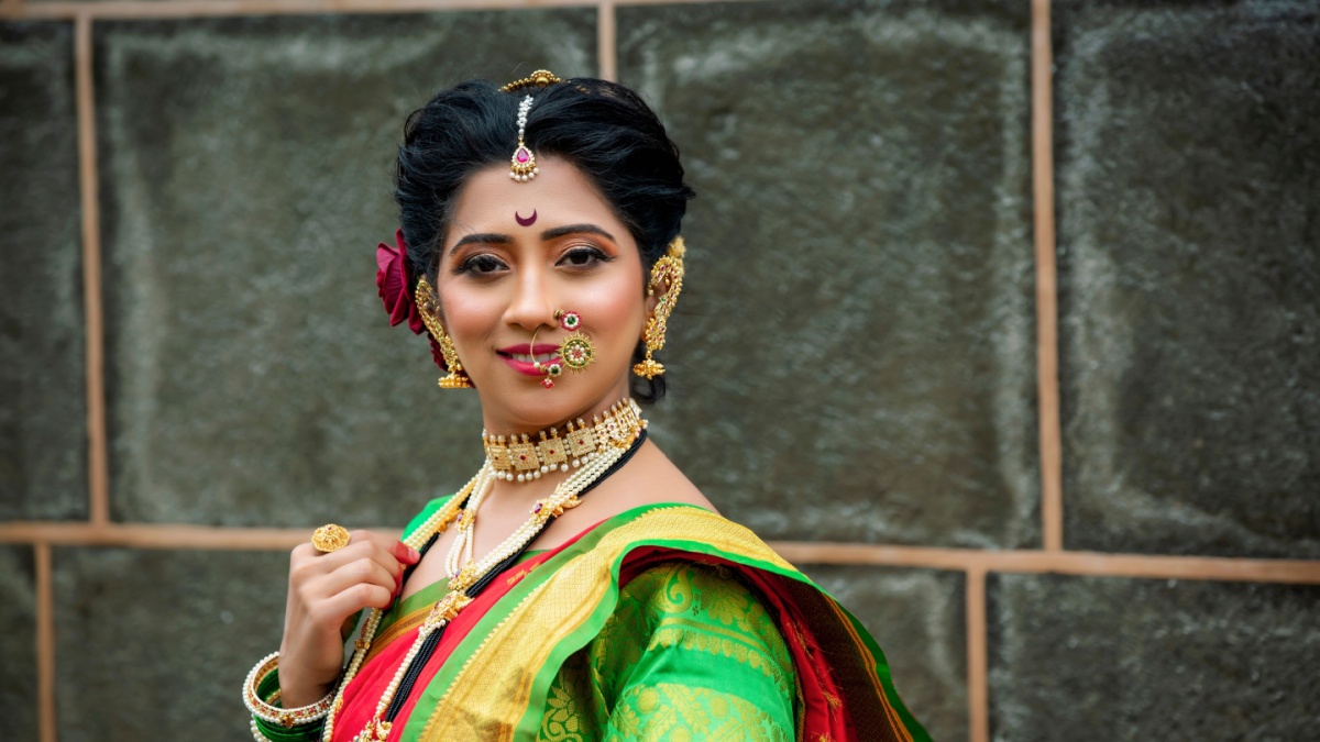 Indian Woman Dressed in Marathi Saree Attire As a Queen in a Temple
