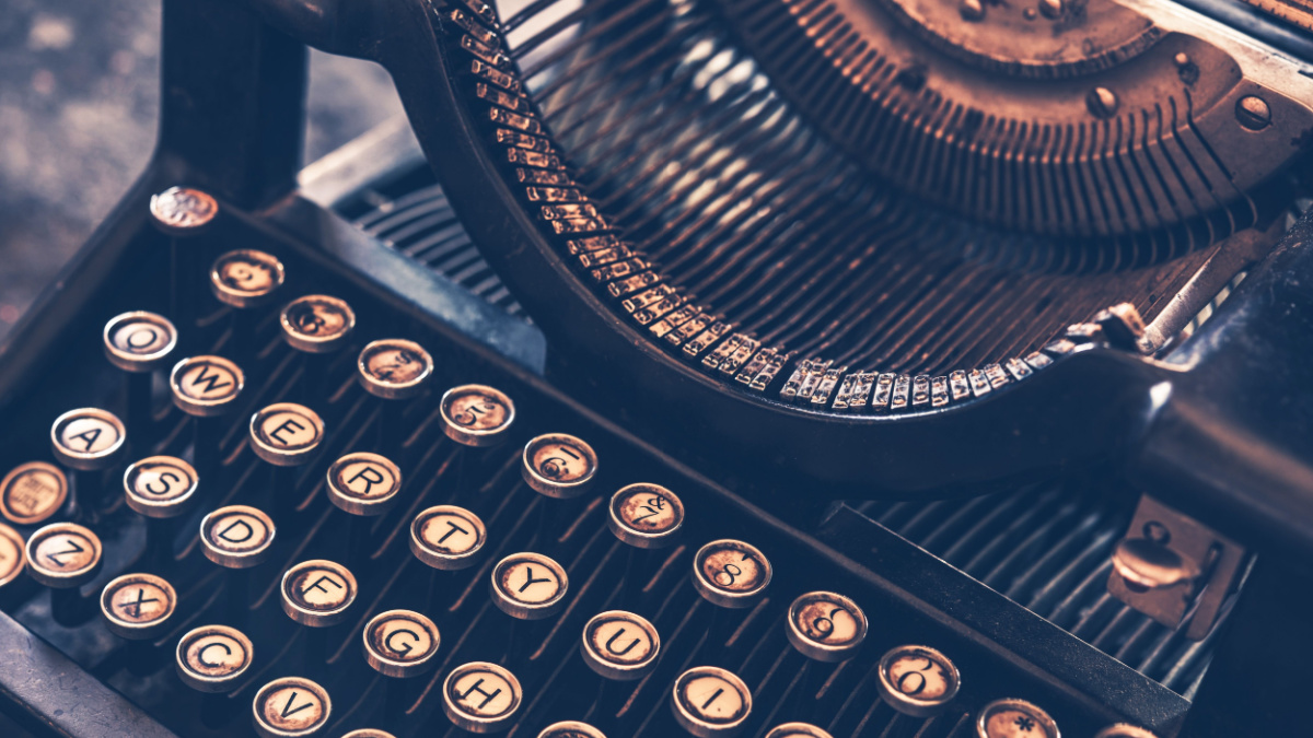 Antique Typewriter. Vintage Typewriter Machine Closeup Photo.