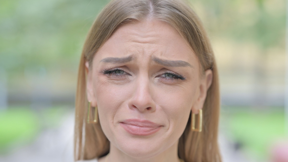 Face Close up of Crying Woman Outdoor.