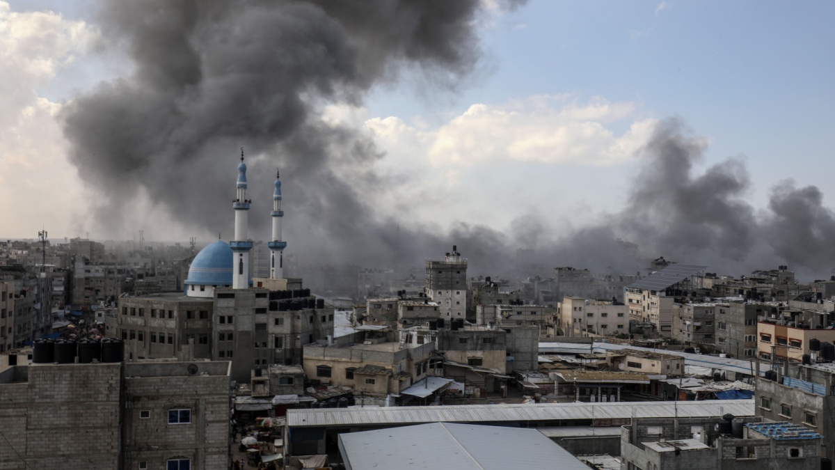 Smoke rises after Israeli air strikes near the border east of the city of Rafah in the southern Gaza Strip, on October 12 2023.