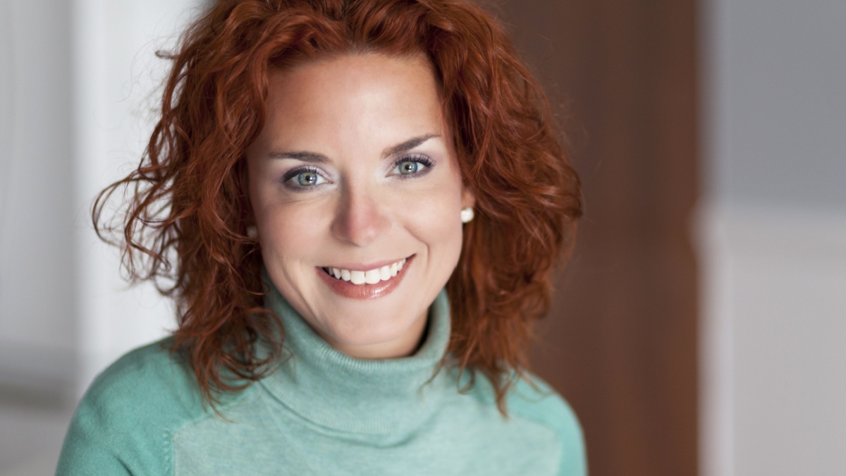 Closeup Of A Pretty Woman Smiling.