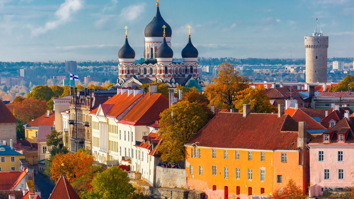 Toompea hill with tower Pikk Hermann and Russian Orthodox Alexander Nevsky Cathedral, view from the tower of St. Olaf church, Tallinn, Estonia.