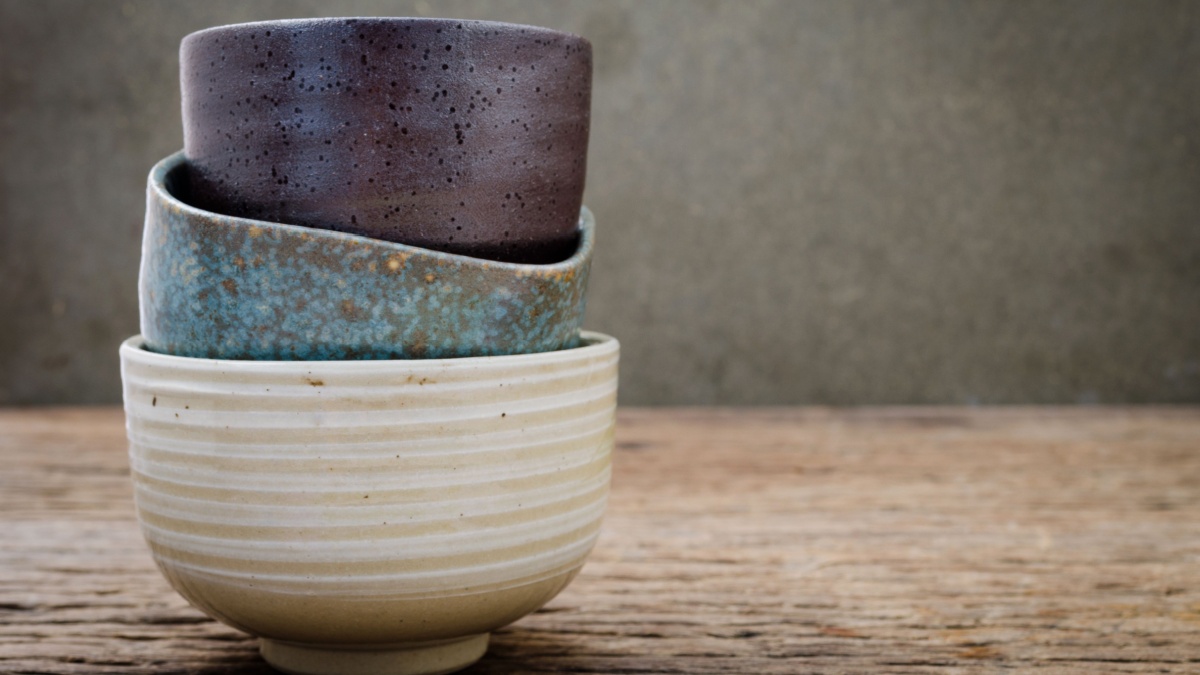 Empty bowl on rustic wood, Japanese handmade ceramic bowl, ceramic texture.