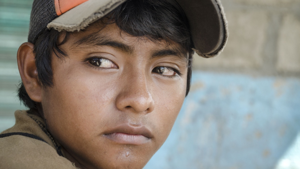 Latin American teen. Great glance portrait from a young boy in the southern border of Mexico.