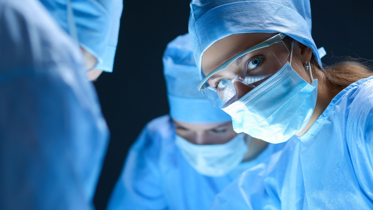 Team surgeon at work on operating in hospital.
