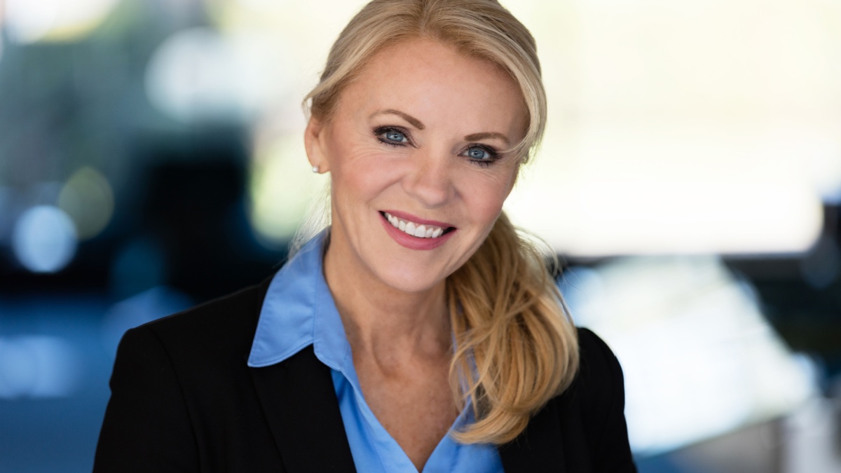 Portrait Of A Mature Businesswoman Smiling At The Camera.