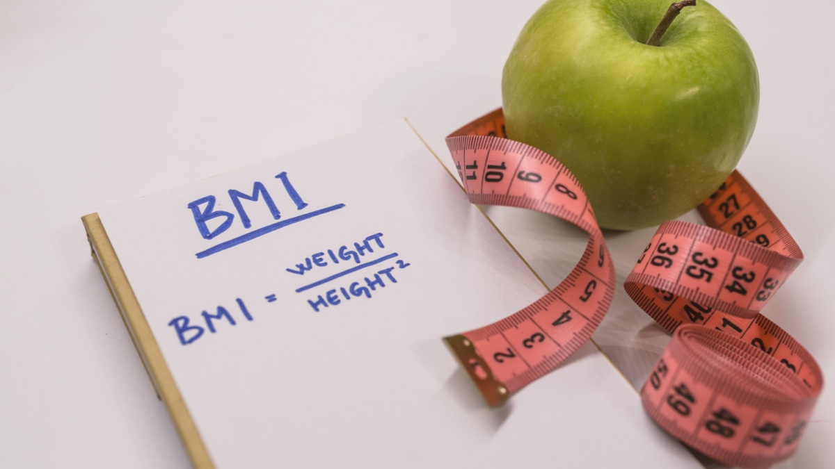 BMI body mass index formula rate in a notepad. BMI. Note written: BMI (body mass index) formula, health conceptual. Concept BMI body mass index formula rate formula, fitness and weight loss.