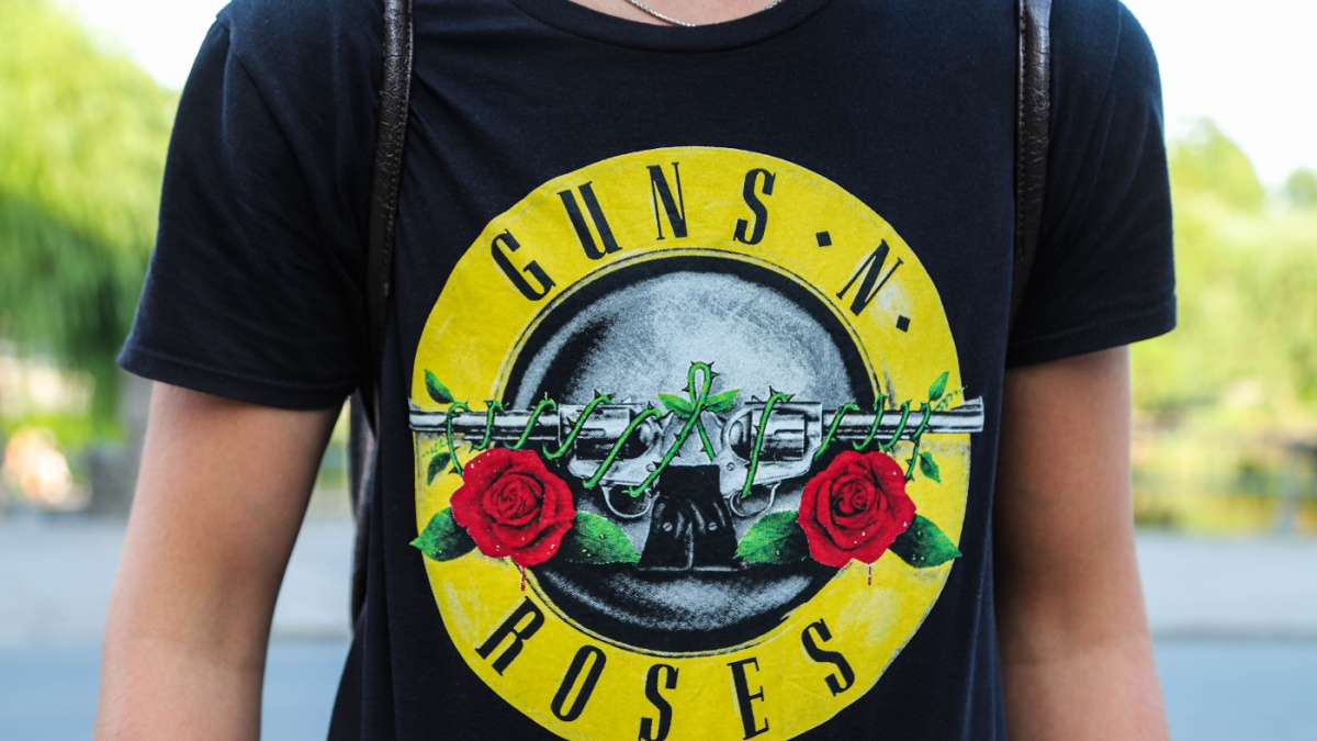 Young man with Guns n' roses T-shirt in the city centre of Orebro, Sweden