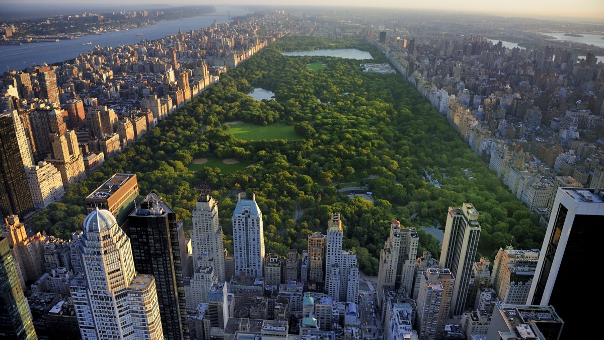 Central Park aerial view, Manhattan, New York; Park is surrounded by skyscraper