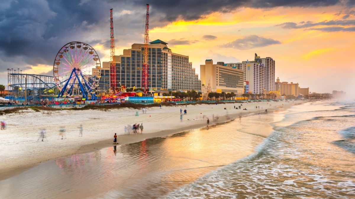 Daytona Beach, Florida, USA beachfront skyline at dusk.