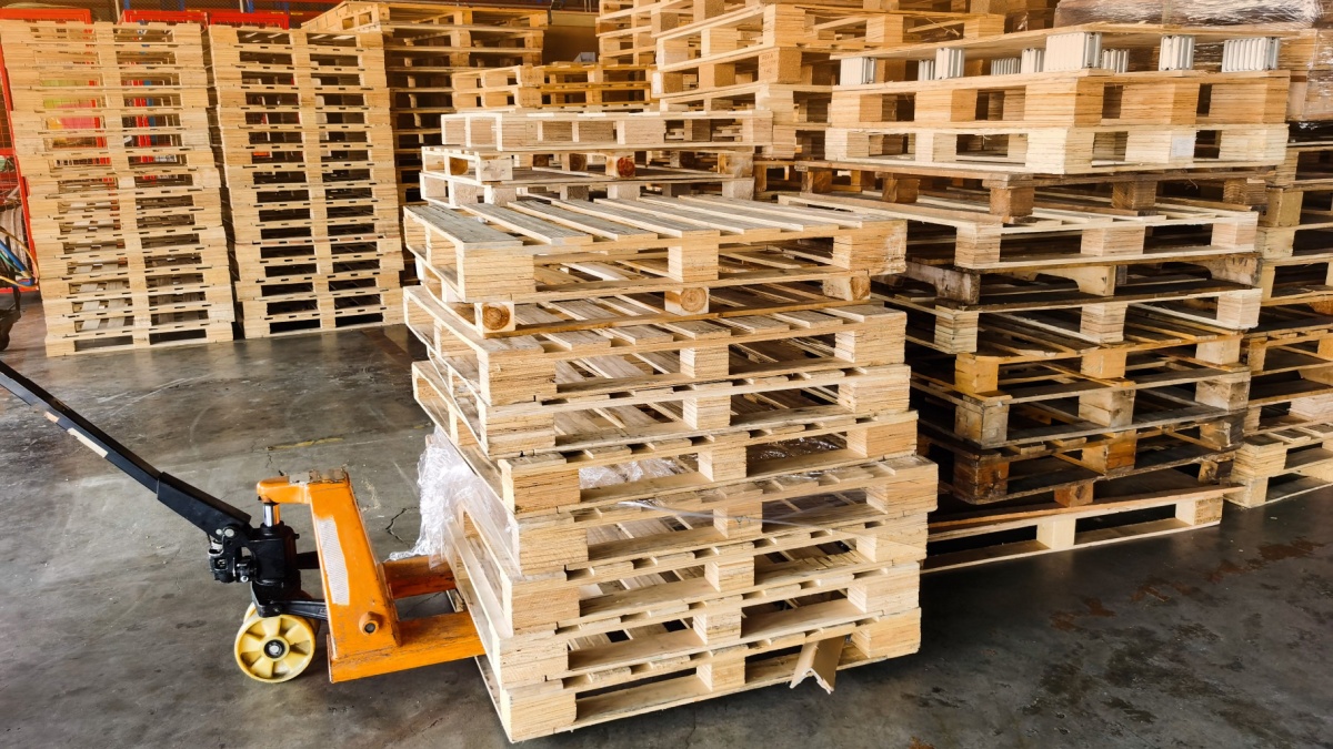 20 Ingenious Ways To Break Free From the 9 to 5 Grind 9 Worker driving forklift to loading and unloading wooden pallets from truck to warehouse cargo storage, shipment in logistics and transportation industrial, wood pallets stack