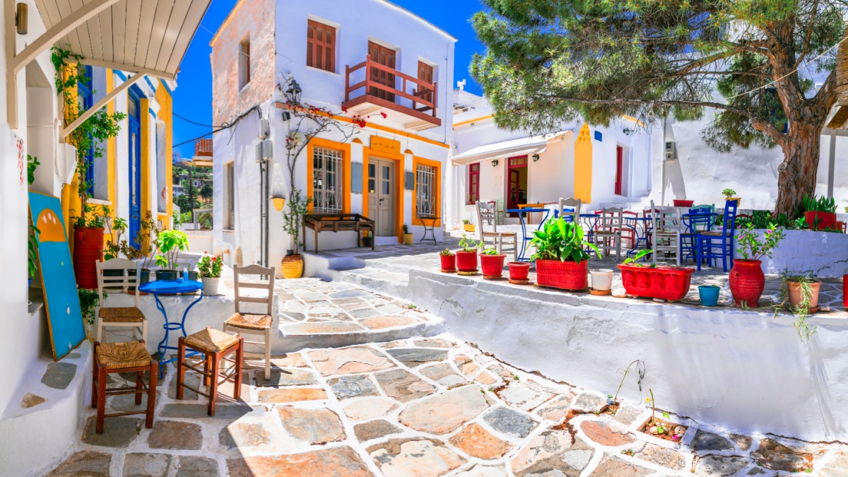 Beautiful Lefkes traditional greek village in Paros island. Charming coffe bars and taverns in colorful narrow streets. Cyclades , Greece