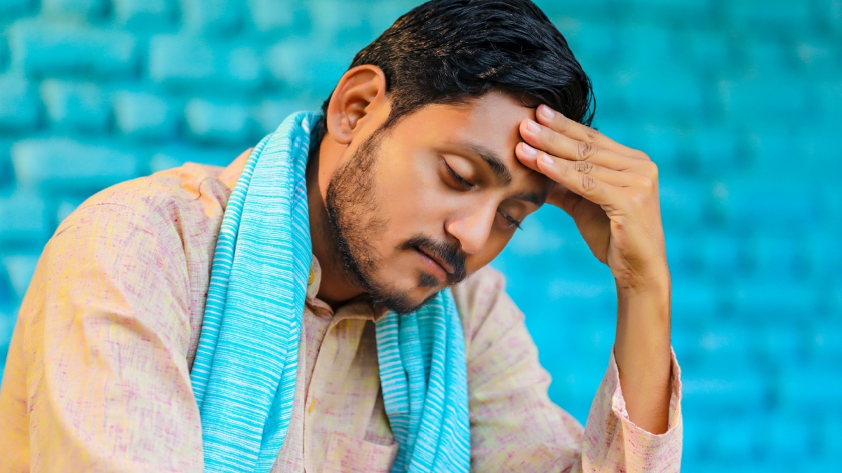 Young indian farmer in depression..