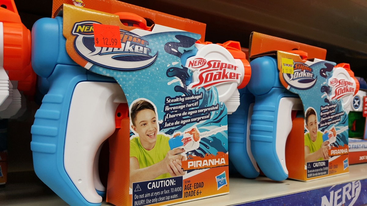 Nerf Super Soaker Water Blaster Gun display on the selves of local toy store or supermarket. Toys for summer activity.