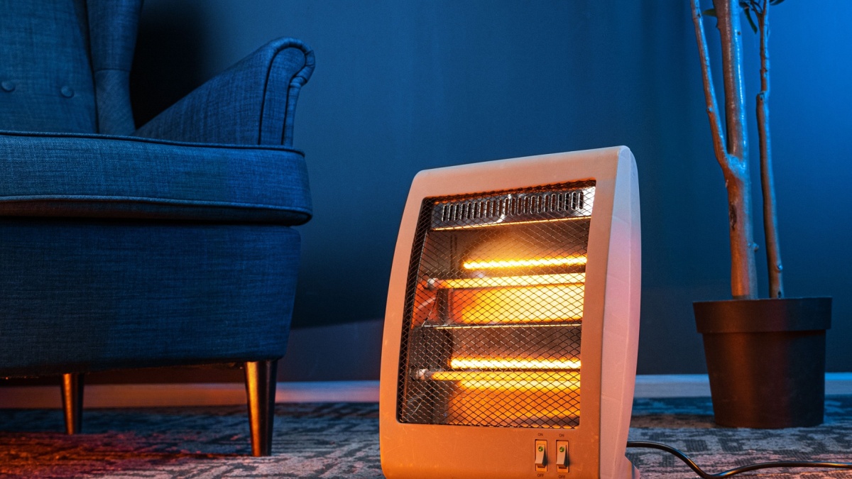 Modern electric infrared heater in the living room