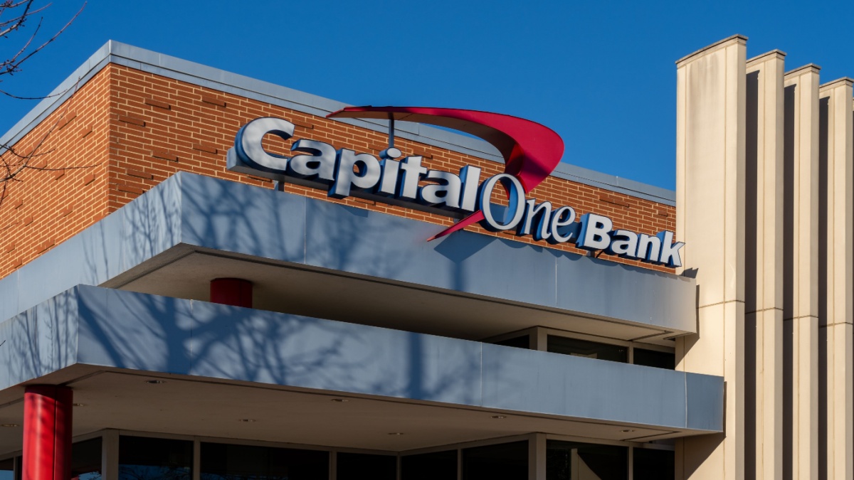 Close up of Capital One bank sign on the building is shown. Capital One Financial Corporation is an American bank holding company.