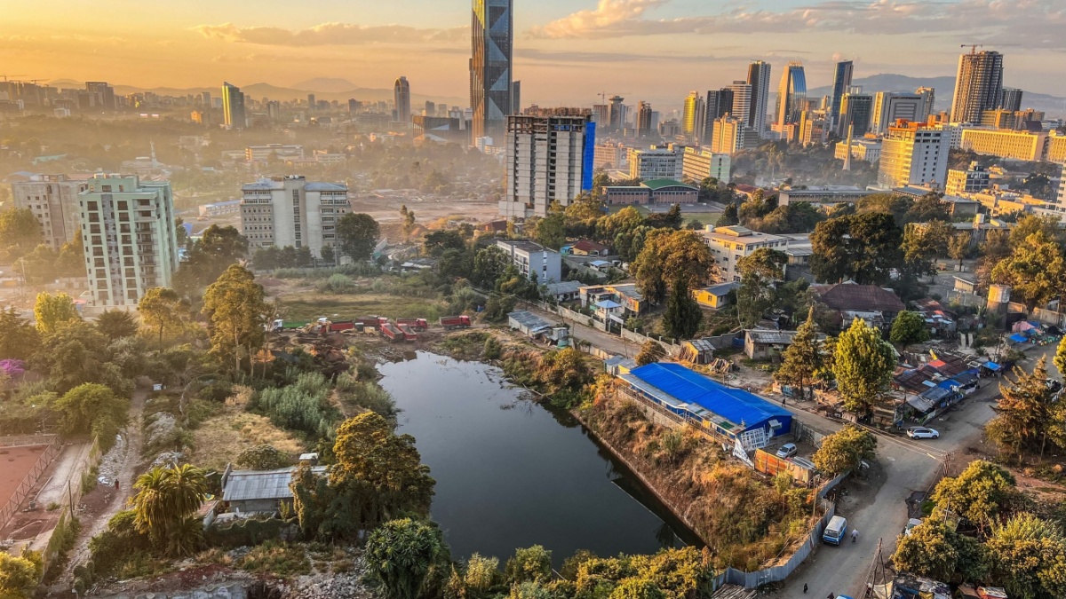Aerial overview of Addis Abeba city, the capital of Ethiopia, showing brand new buildings and construction in the foreground, city centre and suburbs, Ethiopia