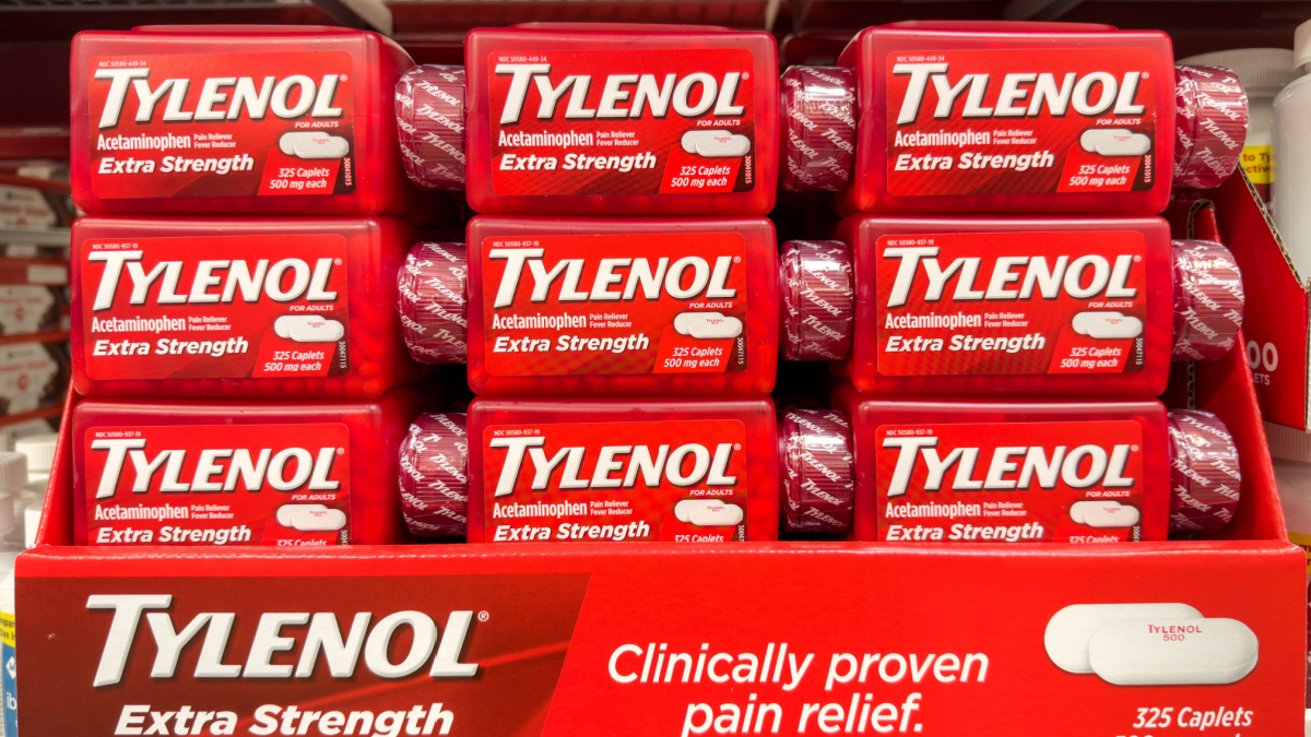 Extra Strength Tylenol 24 caplet boxes on the shelf in a drug store.
