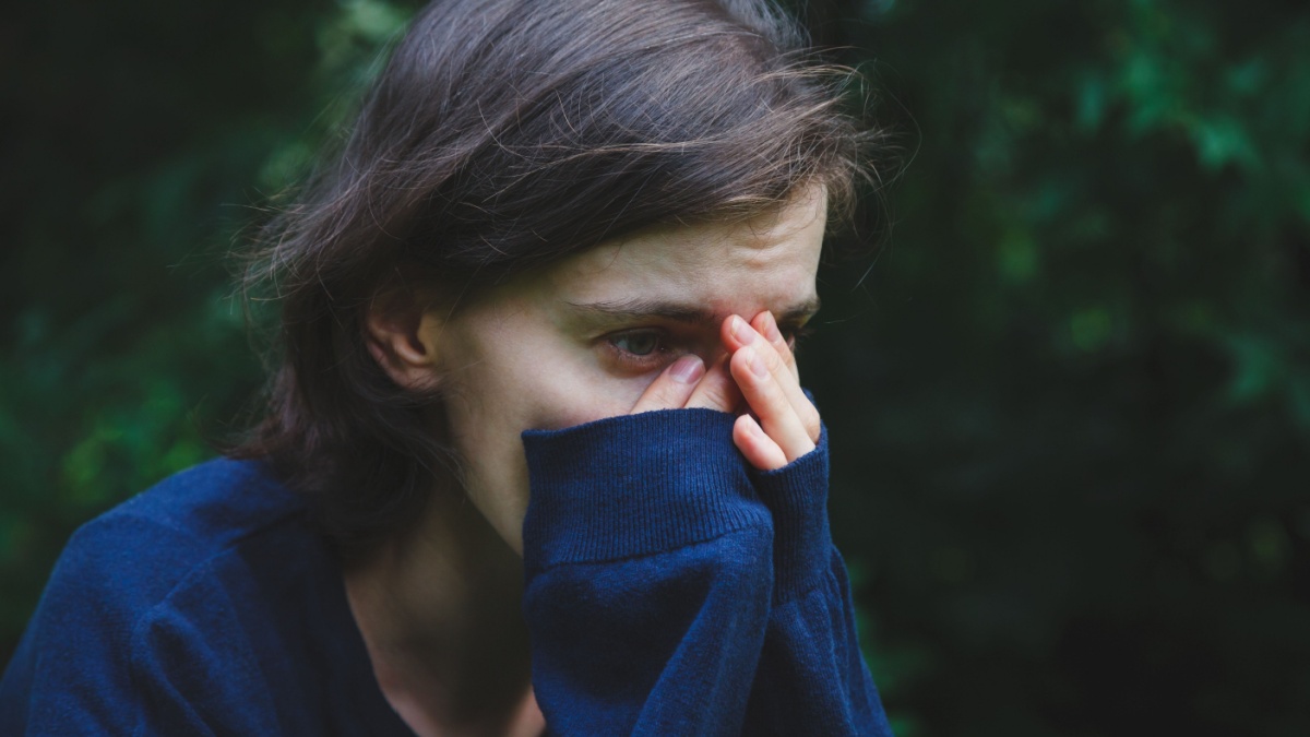 Sad young woman, mental health concept.
