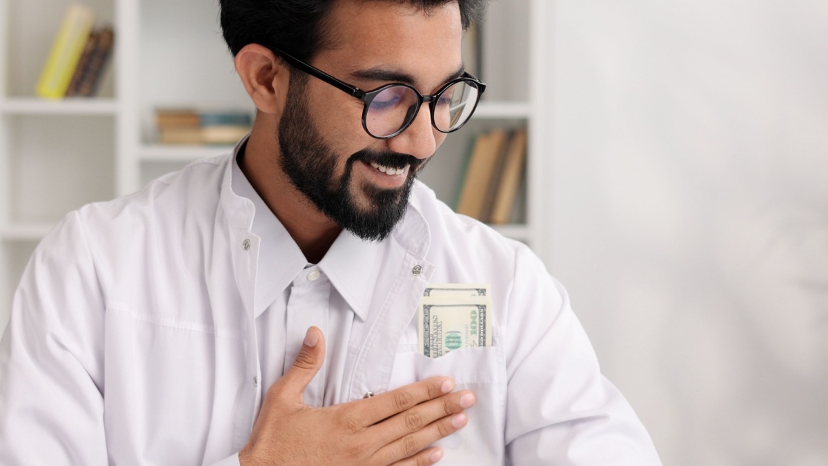 man with money in pocket.