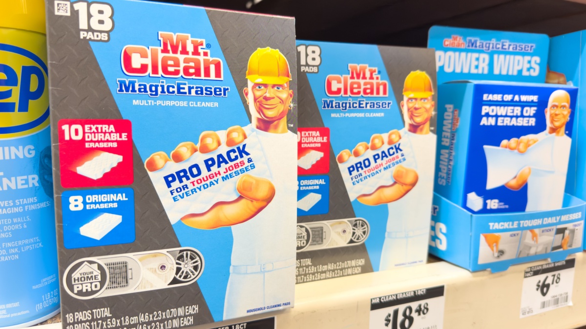 Packs of Mr. Clean magic eraser variety packs on store shelf.