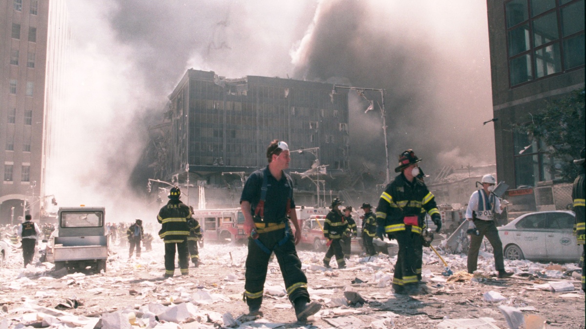 New York City firefighters work near the area known as Ground Zero after the collapse of the Twin Towers September 11, 2001 in New York City.