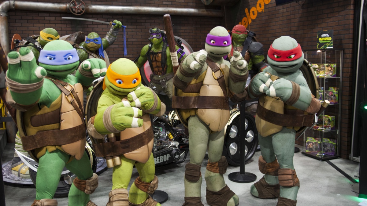 WONDERCON: Los Angeles Convention Center, March 25 thru 27, 2016. Teenage Mutant Ninja Turtles pose for a photo at their booth.