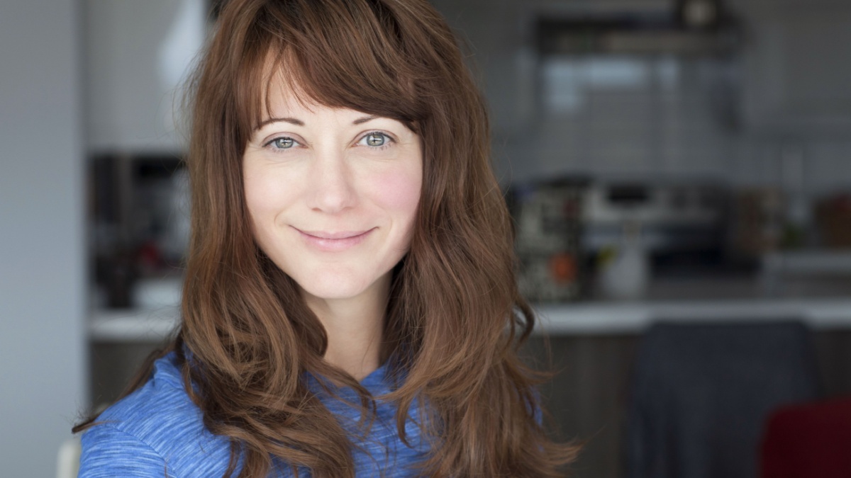 Portrait Of A Mature woman smiling at the camera.