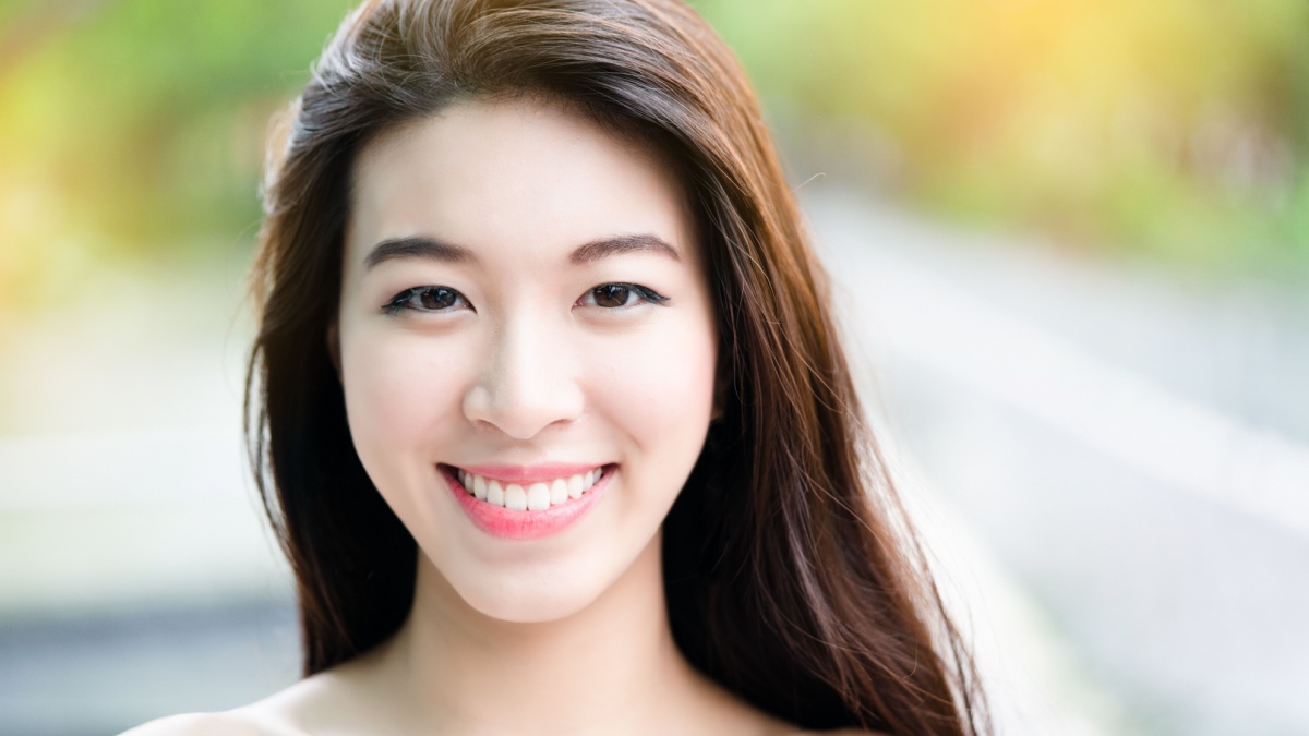 Asian teenage girls have a beautiful face. good health makes the skin look good.