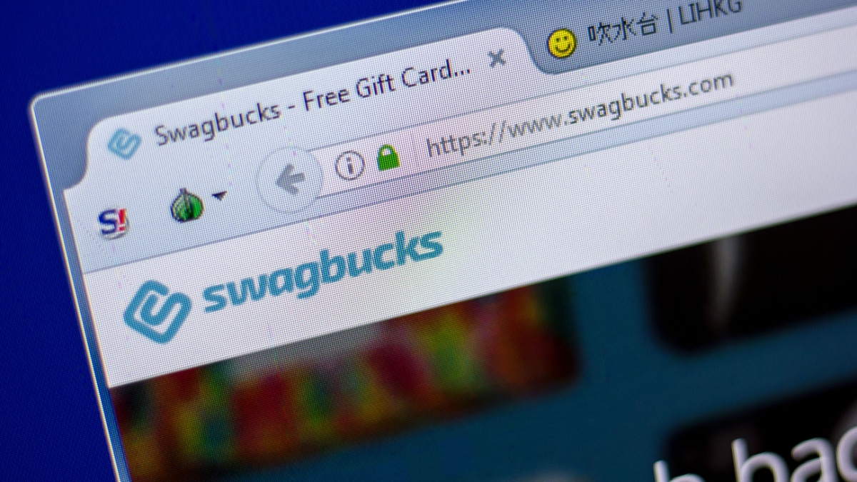 Homepage of Swagbucks website on the display of PC, url - Swagbucks.com.