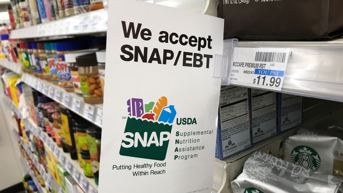 The interior of a retail store in California displaying their participation in the SNAP program.
