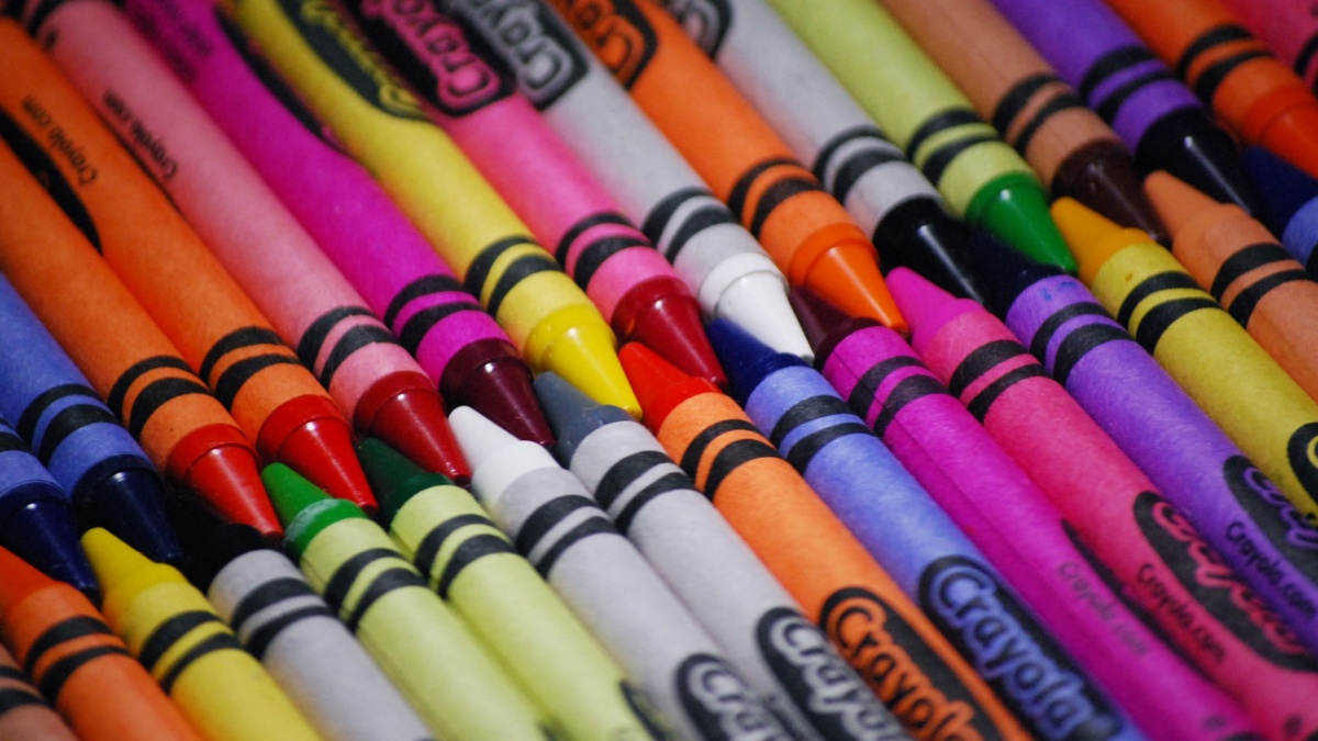 Crayons closeup photo many random colors together.
