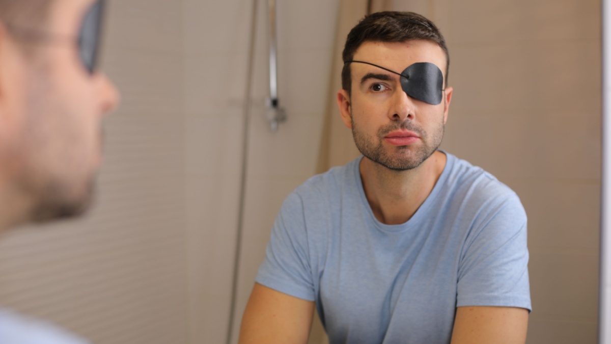 Man wearing a black eyepatch