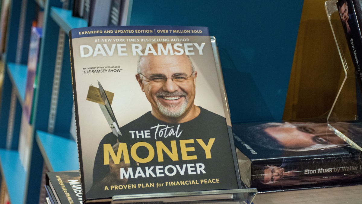 Dubai, UAE - May 09, 2024: Close-up Dave Ramsey's The Total Money Makeover book in the bookstore.