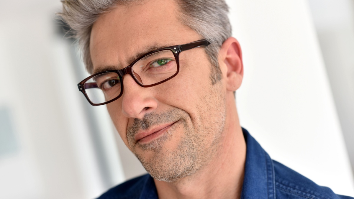 Portrait of handsome mature man with eyeglasses.