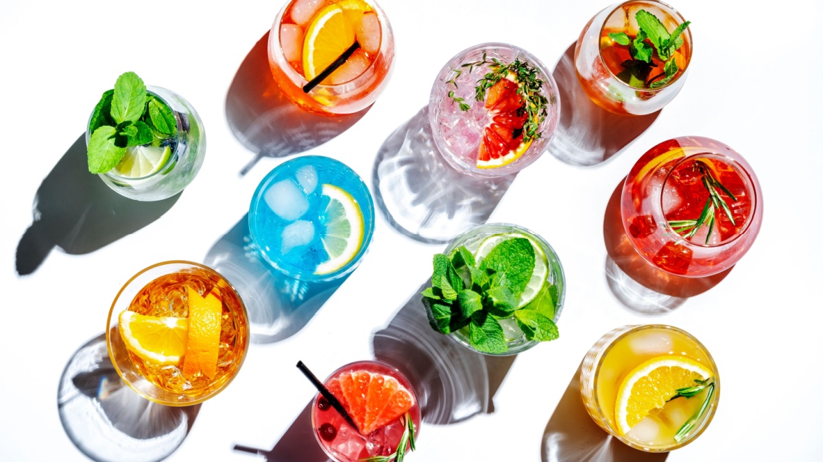Summer cocktails drinks set. Assortment of multicolored strong and low alcoholic beverages for cocktail party.