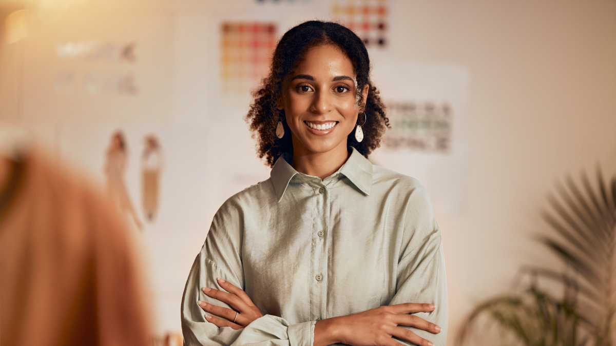 Fashion industry, black woman and designer portrait of clothing tailor with business vision. Smile, startup and small business entrepreneur with happiness and business growth feeling working success.